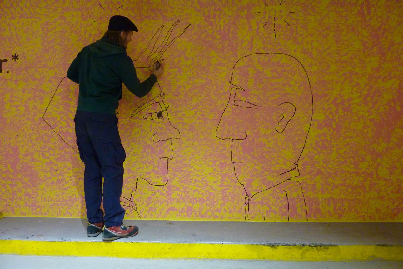 Wolfgang Kschwendt drawing on a wall